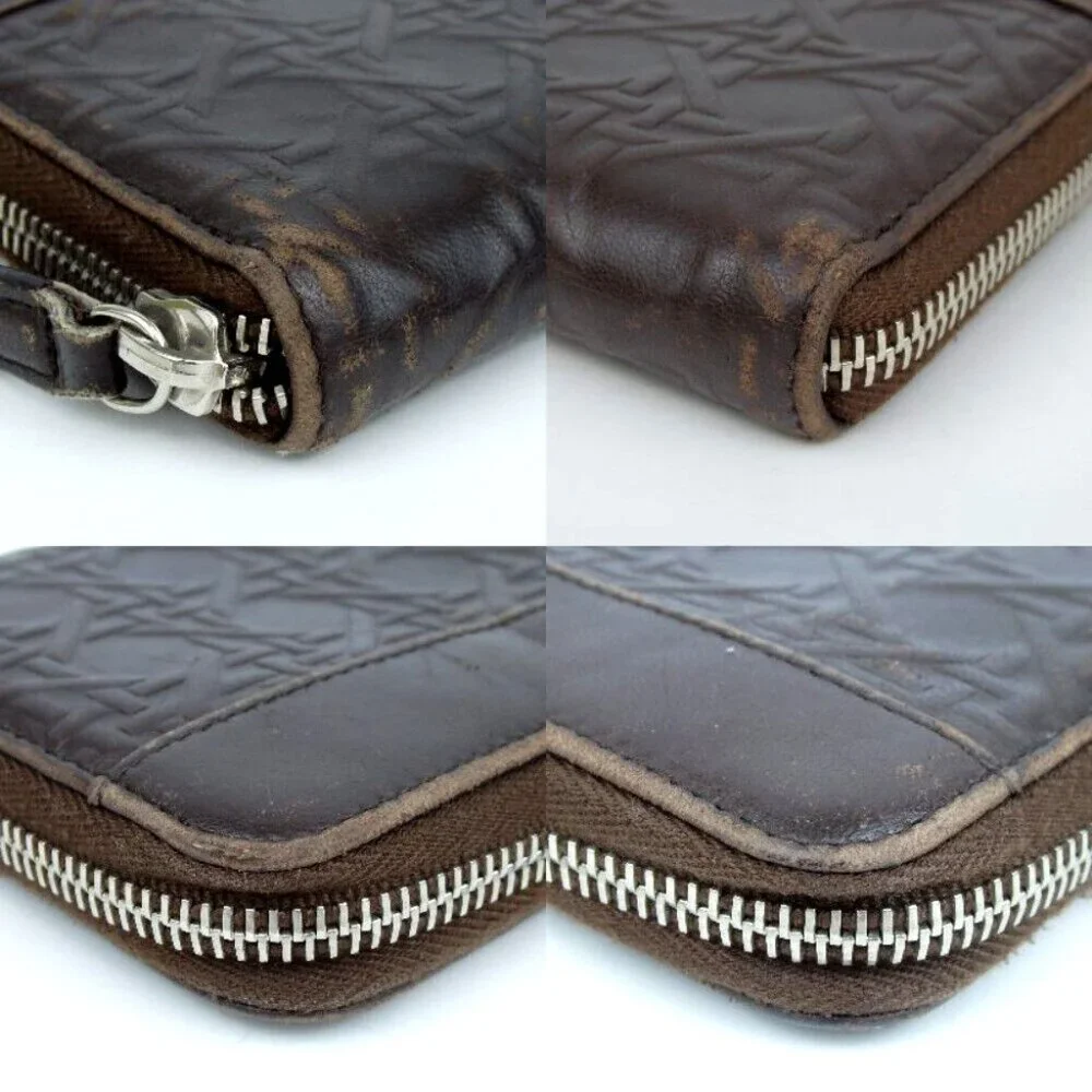Authentic Christian Dior Cannage-embossed zip-around purse leather [Used]